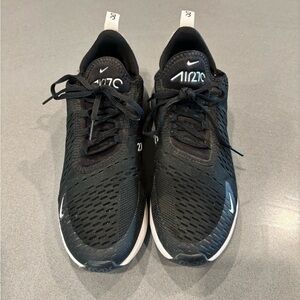 Nike Black Sneakers with Breathable Upper and Sleek Design